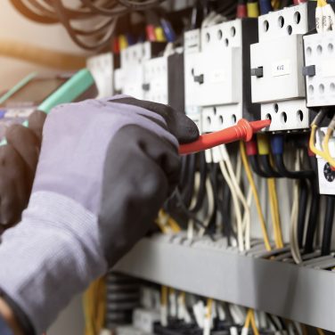 Electrician engineer testing an electrical installation