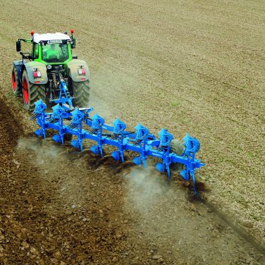 Lemken plough being pulled though a field